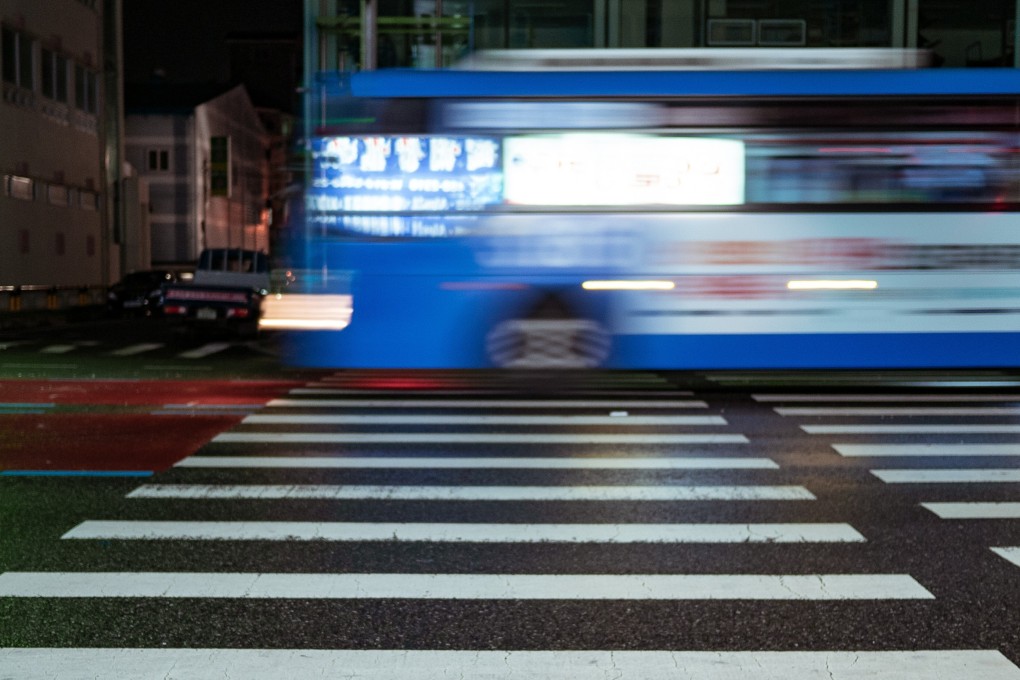 A bus rushes past a pedestrian crossing in Seoul. Photo: Shutterstock