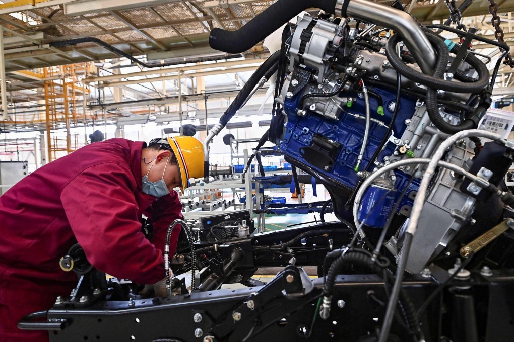 China must protect its manufacturing sector to prevent a US-style demise, experts say. Photo: AFP