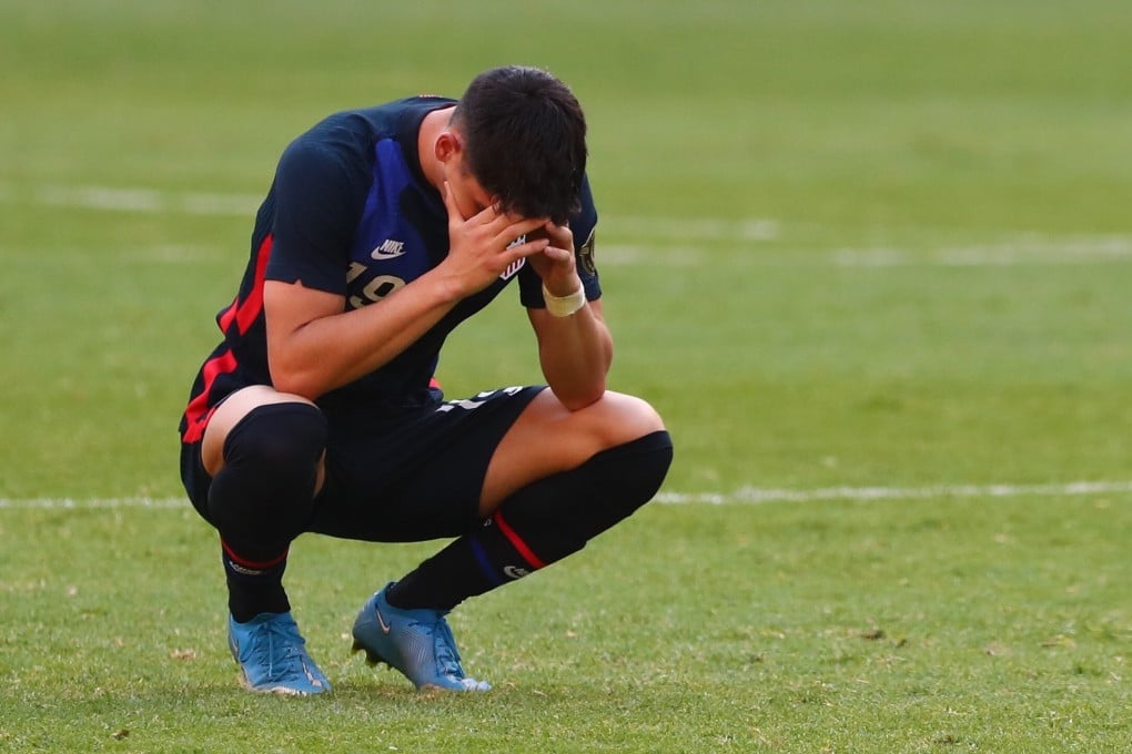 Team USA’s Sebastian Soto is dejected after the loss to Honduras. Photo: Reuters