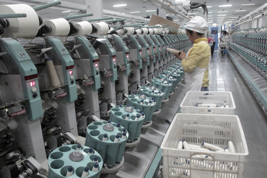 A worker at a textile factory in the Xinjiang Uygur autonomous region. Photo: Reuters