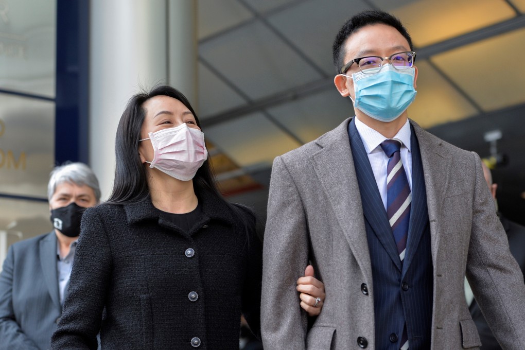 Huawei Technologies chief financial officer Meng Wanzhou returns to court in Vancouver following a break on Monday, accompanied by a Huawei employee. Photo: Reuters