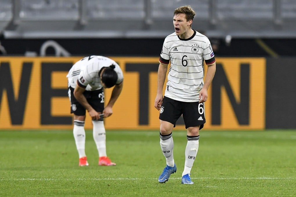 Germany’s Joshua Kimmich (centre) reacts after Germany concedes a second goal during the World Cup 2022 group J qualifying match against North Macedonia. Photo: AP