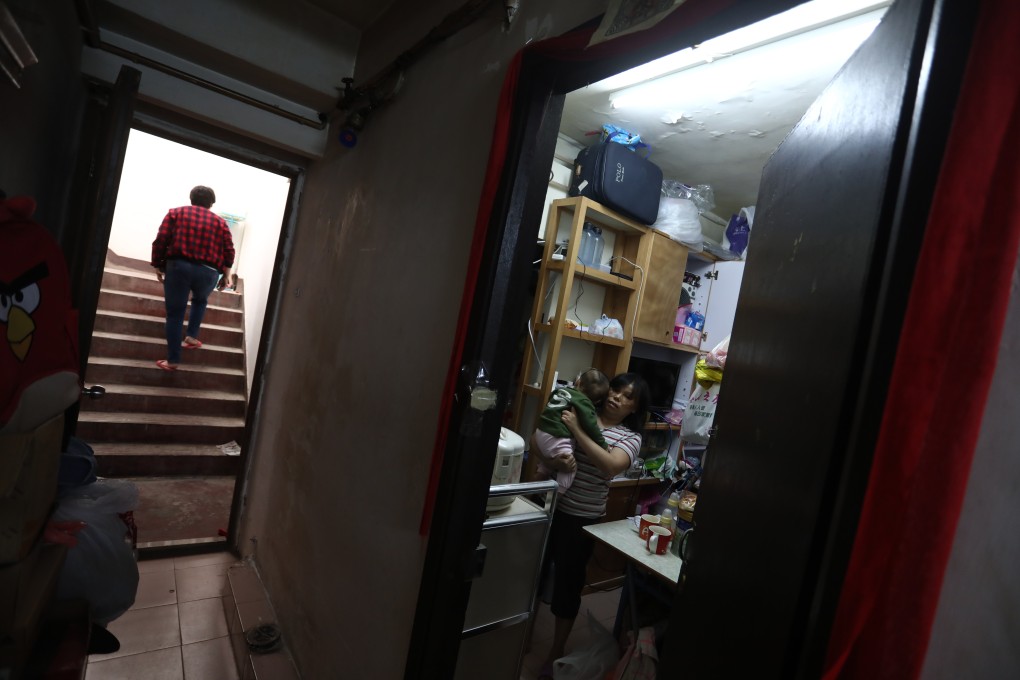 Occupants of Hong Kong’s subdivided flats are often poor families whose income growth lags rent rises. Photo: Jonathan Wong