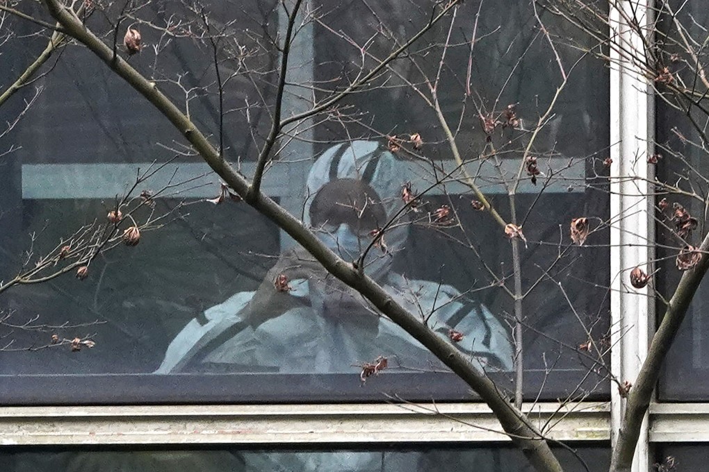 A member of the World Health Organization team during a field visit to the Hubei Animal Disease Control and Prevention Center in Wuhan. Photo: AP
