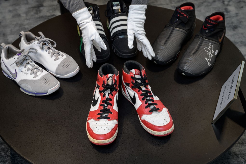 Sotheby’s is getting into selling sneakers. A pair of basketball legend Michael Jordan’s famous Air Jordans from his rookie season, at a preview of the Sotheby’s sale. Photo: Fabrice Coffrini/AFP