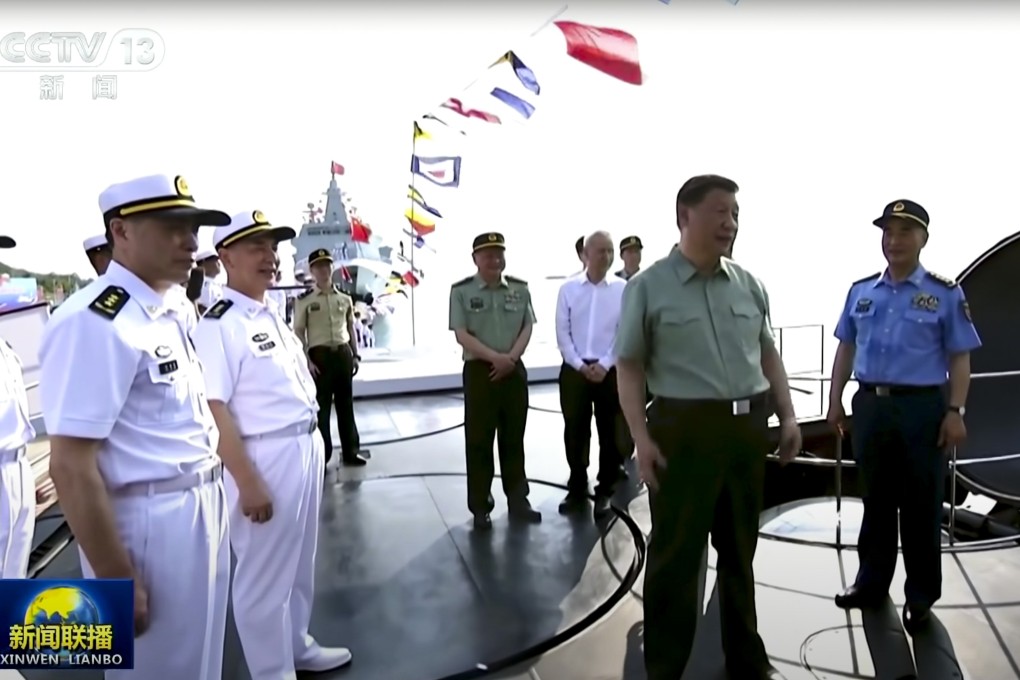 China’s President Xi Jinping stands aboard the Type 094A nuclear-powered ballistic missile submarine. Source: CCTV