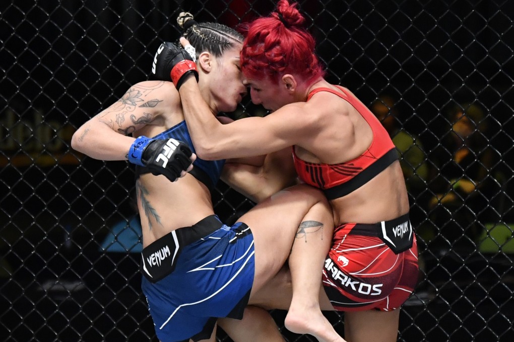 Luana Pinheiro (left) knees Randa Markos in their strawweight bout during the UFC Fight Night event on May 1, 2021 in Las Vegas, Nevada. Photos: Jeff Bottari/Zuffa LLC