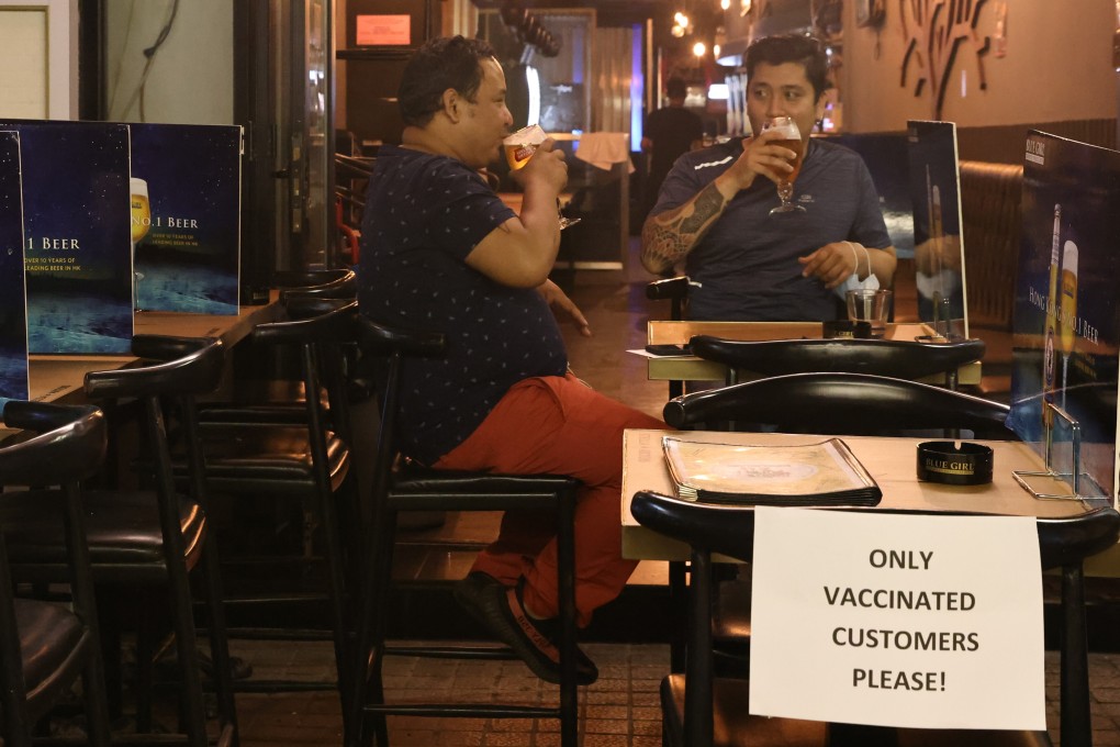 A bar reopens in Tsim Sha Tsui on April 29. Bars and nightclubs are conditionally allowed to reopen at half capacity till 2am if all staff and customers receive at least one vaccine dose. Photo: K.Y. Cheng