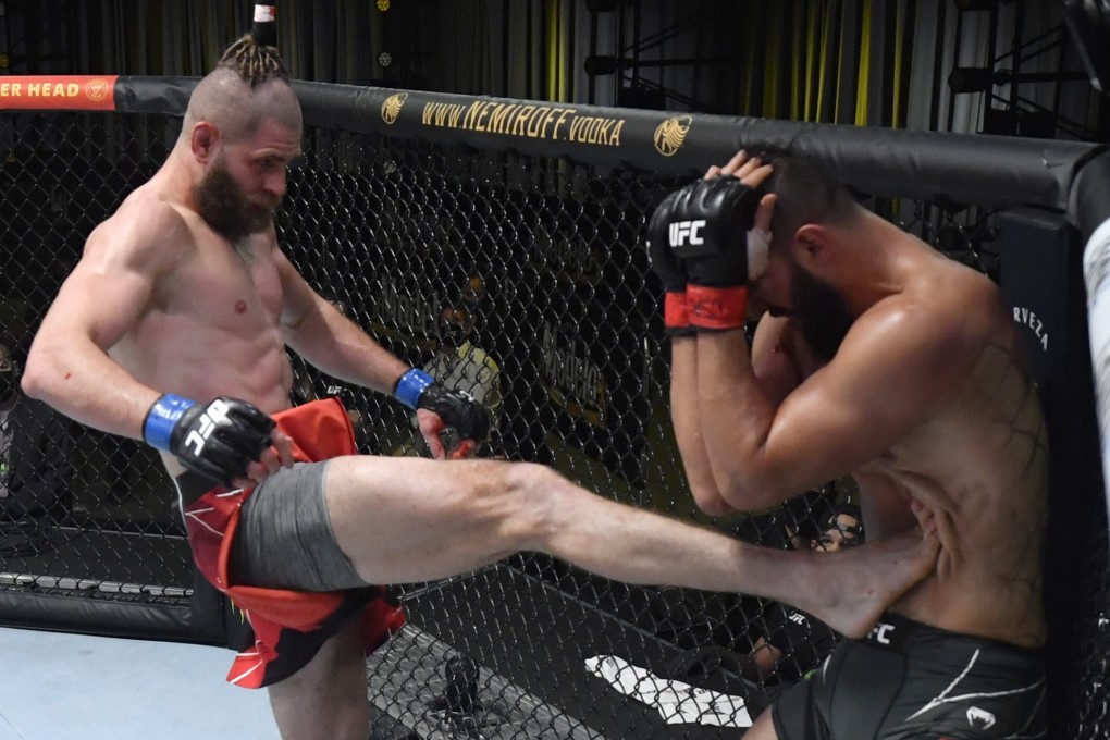 Jiri Prochazka kicks Dominick Reyes in their light heavyweight bout at UFC Vegas 25. Photos: Jeff Bottari/Zuffa LLC