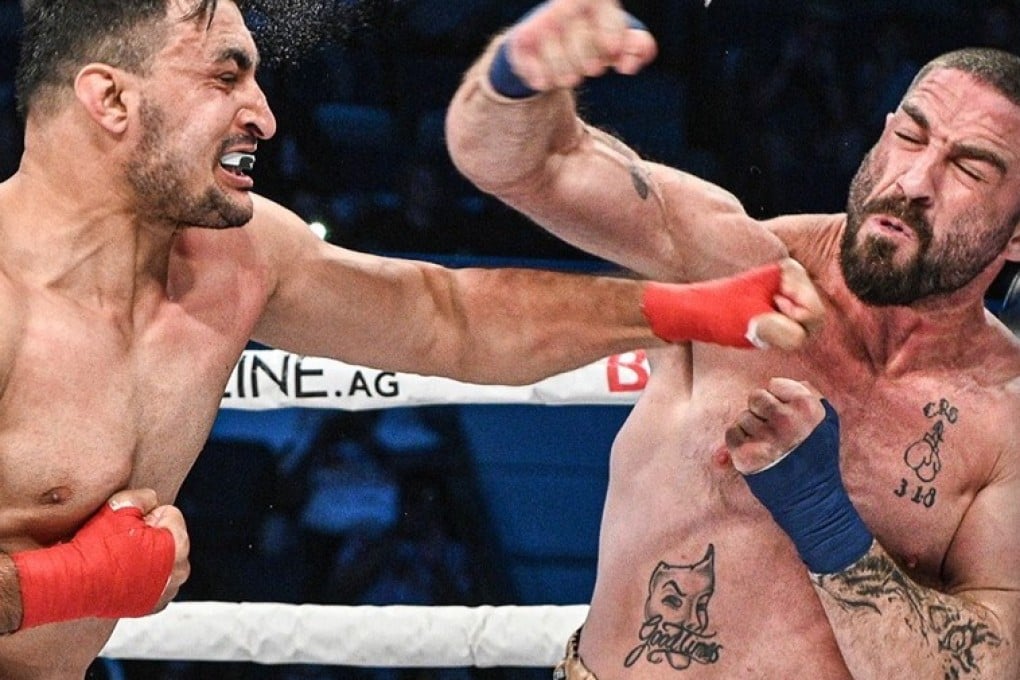 Ezatullah Kakar catches Chris Sarro with a left during their BKFC 17 cruiserweight fight in Birmingham, Alabama. Photos: BKFC