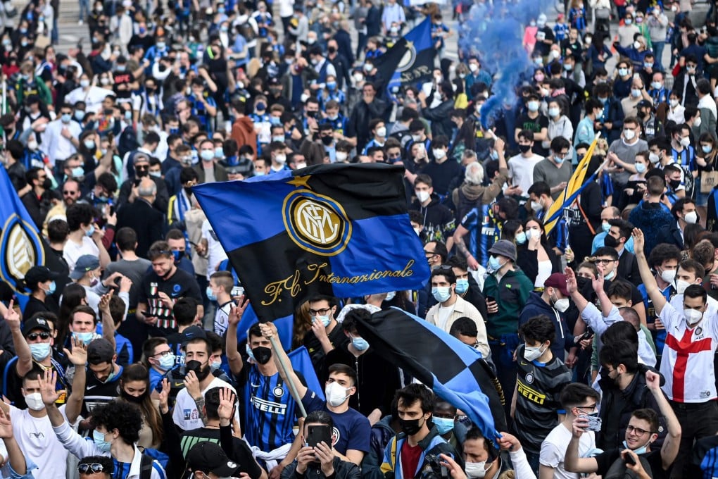 Inter Milan supporters celebrate the club’s Serie A title win at Piazza Duomo in Milan. Photo: AFP