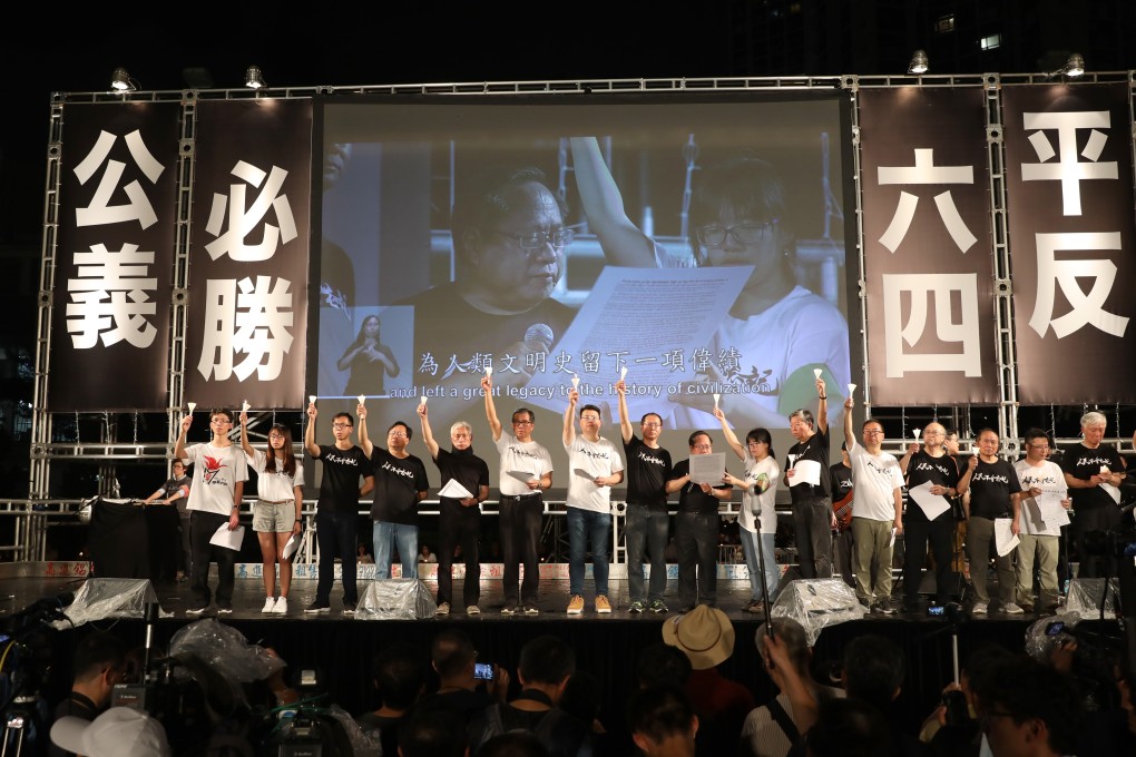 Albert Ho (centre) among alliance members on stage at the 2019 event, the last time the annual vigil was allowed to proceed. Photo: Sam Tsang