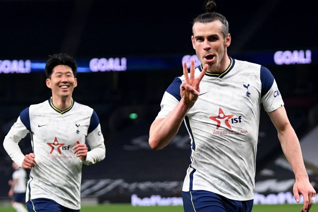Gareth Bale celebrates scoring Tottenham Hotspur’s third goal and his hat-trick with Son Heung-min. Spurs wore the logo of Cambodian NGO Indochina Starfish Foundation on their shirts. Photo: Reuters