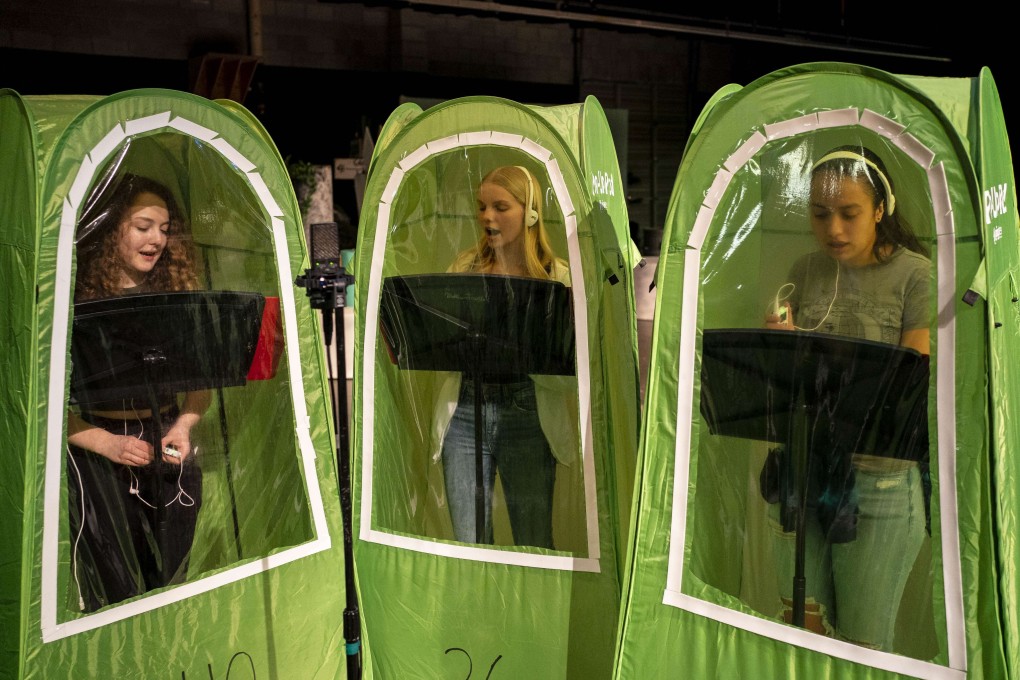 Students record vocals in pop-up tents during choir class at Wenatchee High School in Wenatchee, Washington. File photo: AFP