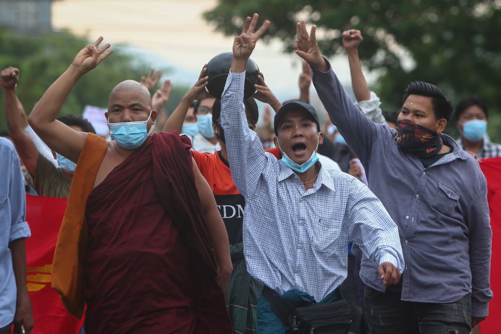 Demonstrators march during an anti-military coup protest in Mandalay on May 3, 2021. Photo: EPA-EFE