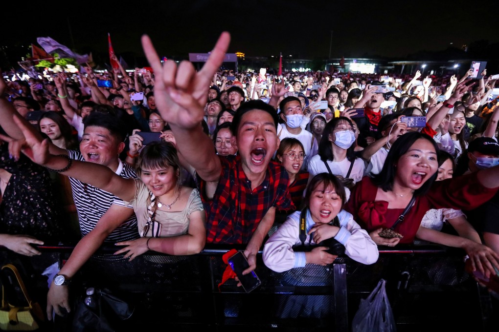 Fans attend the Strawberry Music Festival in Wuhan during the Labour Day holiday on May 1. People in China are going mask-free and partying again after months of pandemic restrictions last year. Photo: Reuters