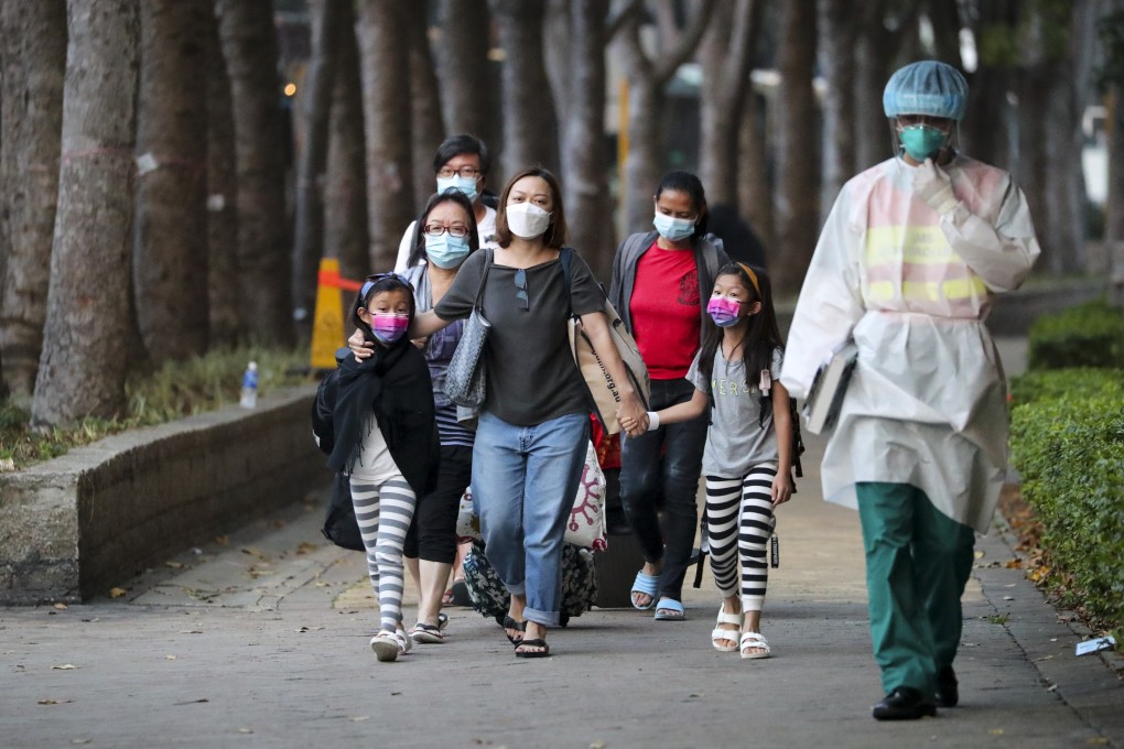 Residents are evacuated from Block 11 of Carmel Cove, Caribbean Coast, in Tung Chung on April 30, after an untraceable preliminary-positive case was found to be carrying a mutated strain. Photo: Edmond So