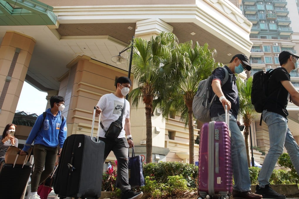 Residents are evacuated from Block 11 of Carmel Cove, Caribbean Coast, in Tung Chung on April 30 after a woman was found to be carrying a mutated strain of the coronavirus. Photo: Winson Wong