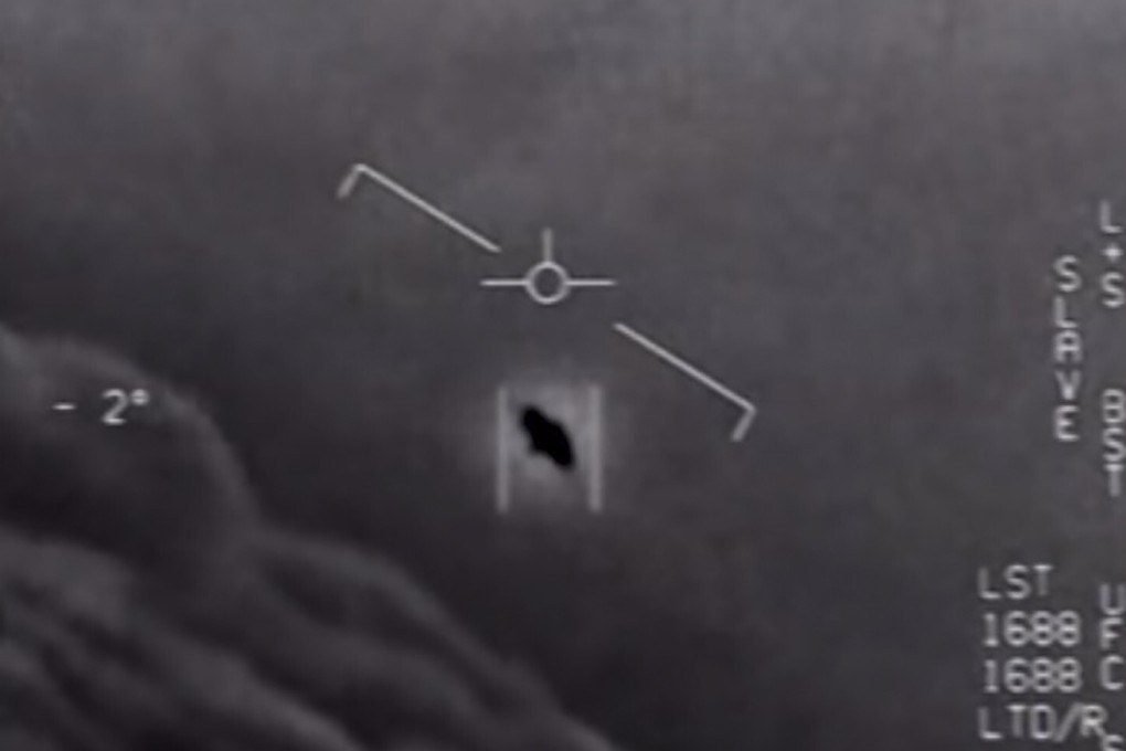 A screen grab from an unclassified video taken by US Navy pilots shows an interactions with an “unidentified aerial phenomena”. Image: US Department of Defence via AFP