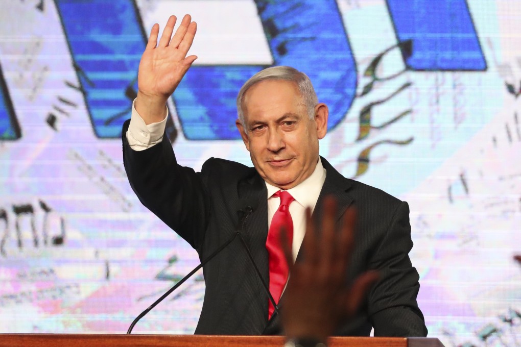 Israeli Prime Minister Benjamin Netanyahu waves to his supporters at his Likud party's headquarters in Jerusalem in March. Photo: AP