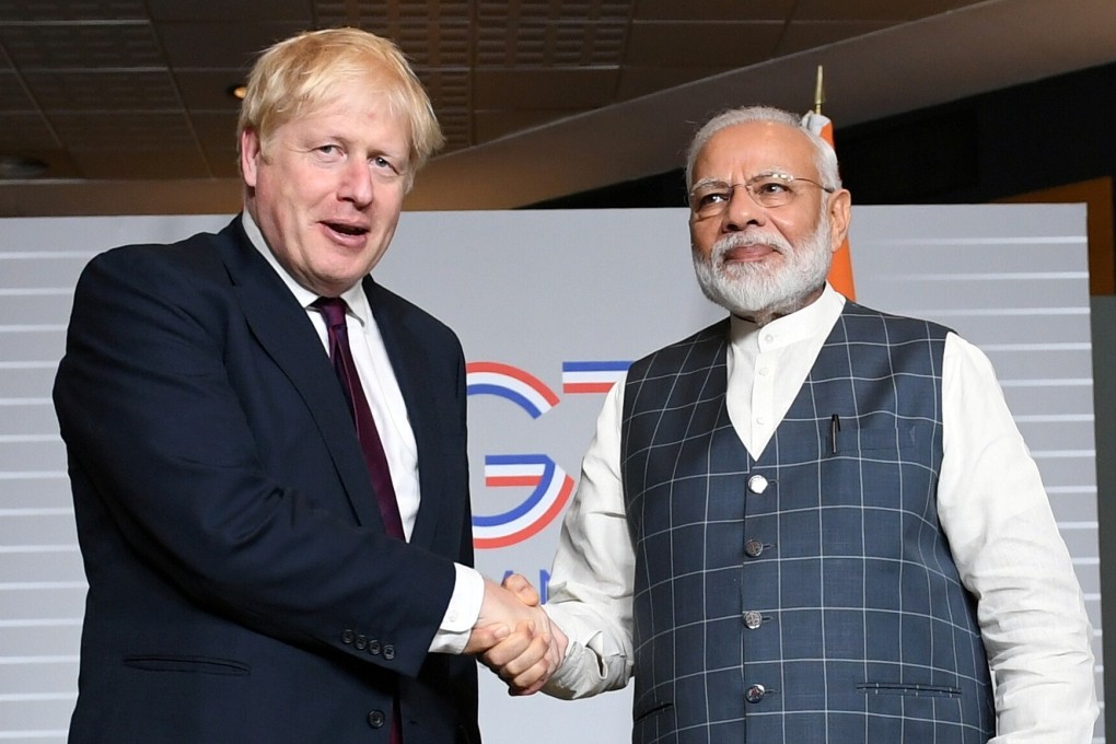 Britain's Prime Minister Boris Johnson shakes hands with Indian Prime Minister Narendra Modi at a bilateral meeting during the G7 summit in Biarritz, France in August 2019. Photo: Reuters