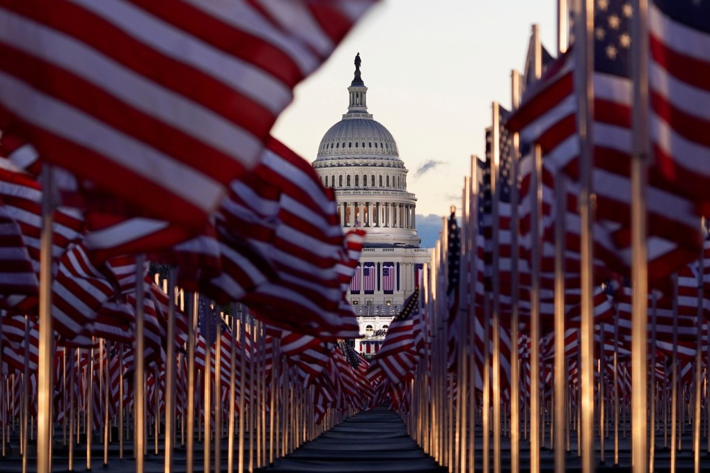 US flags adorn the National Mall in front of the Capitol building ahead of Joe Biden’s inauguration as US president in Washington on January 20. Photo: Reuters