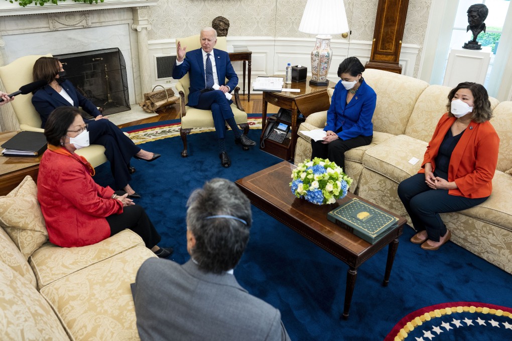 US President Joe Biden, accompanied by from left, Vice-President Kamala Harris, senators Mazie Hirono and Mark Takano, congresswomen Judy Chu and Grace Meng, speaks during a meeting with members of the Congressional Asian Pacific American Caucus Executive Committee at the White House. Photo: AFP