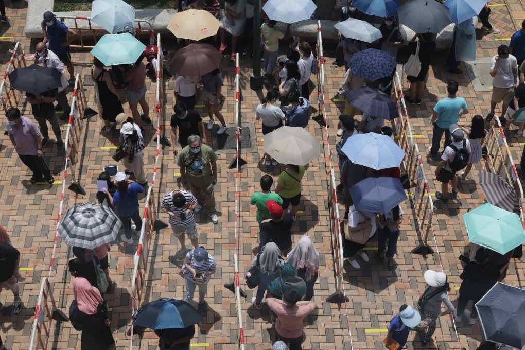 Residents wait for Covid-19 tests in Hong Kong. The government’s handling of the pandemic has been criticised. Photo: May Tse