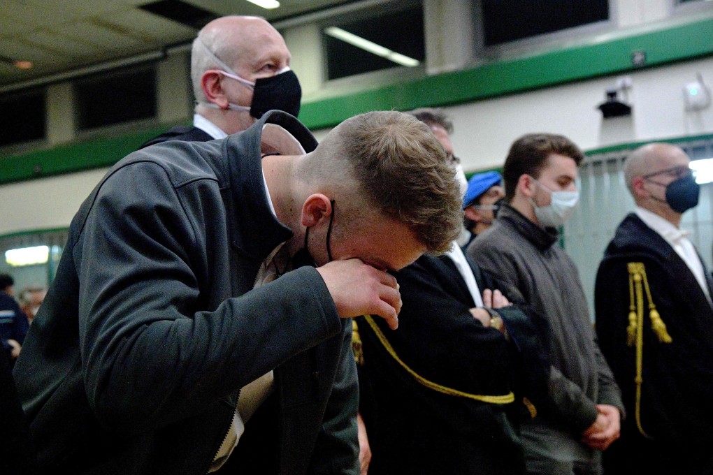 US citizen Finnegan Lee Elder (left, with fellow American Gabriel Natale-Hjorth, second from right) cries after being convicted in Rome on Wednesday for the 2019 murder of a police officer. Photo: AFP