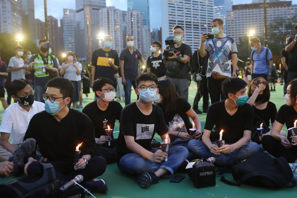 Joshua Wong (centre) last week admitted taking part in the unauthorised June 4 vigil. Photo: Sam Tsang