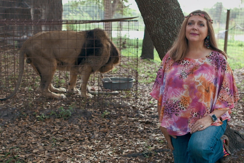 Big Cat Rescue founder Carole Baskin is seen with a lion in a still from Netflix documentary Tiger King. Photo: Neflix via TNS