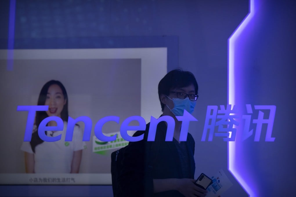 A visitor walks past a logo for Tencent at the company’s display at the China International Fair for Trade in Services in Beijing, China, on September 5, 2020. Photo: AP Photo