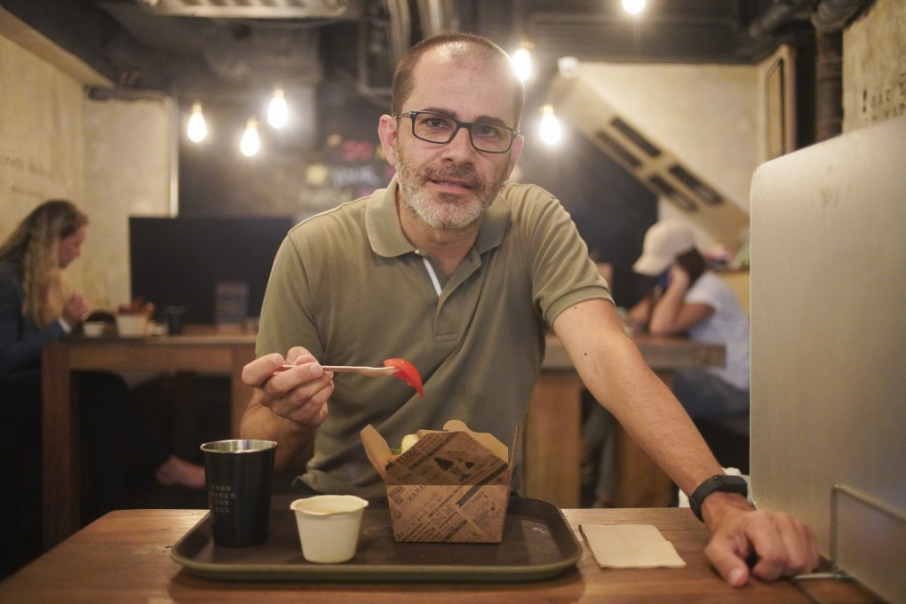 Oskar Valles enjoys a meal at Mana restaurant in Central, Hong Kong. Valles used to rush his meals and often turned to food when he was stressed. Now he is more mindful of what and how he eats. Photo: Winson Wong