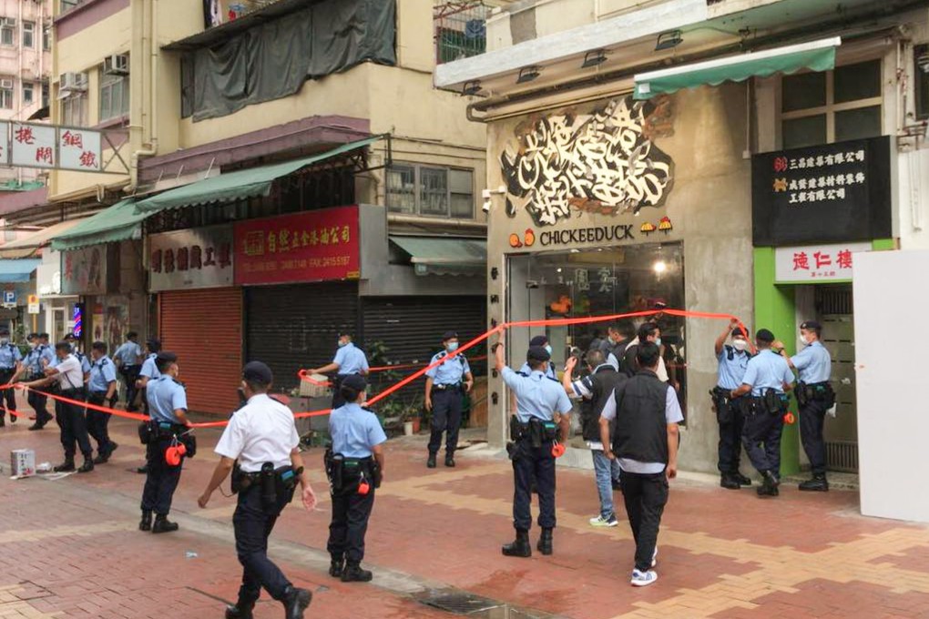 National security police serve a search warrant at an outlet of the children’s clothing store Chickeeduck on Thursday. Photo: Facebook