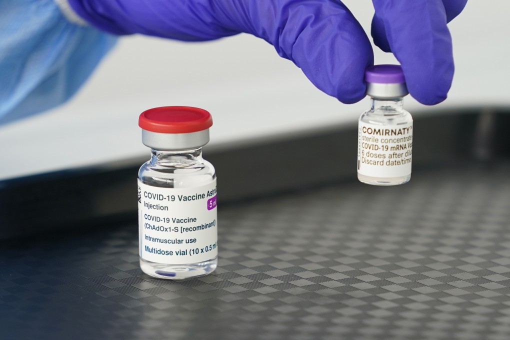 A healthcare worker holds an Astrazeneca vaccine vial. Photo: DPA