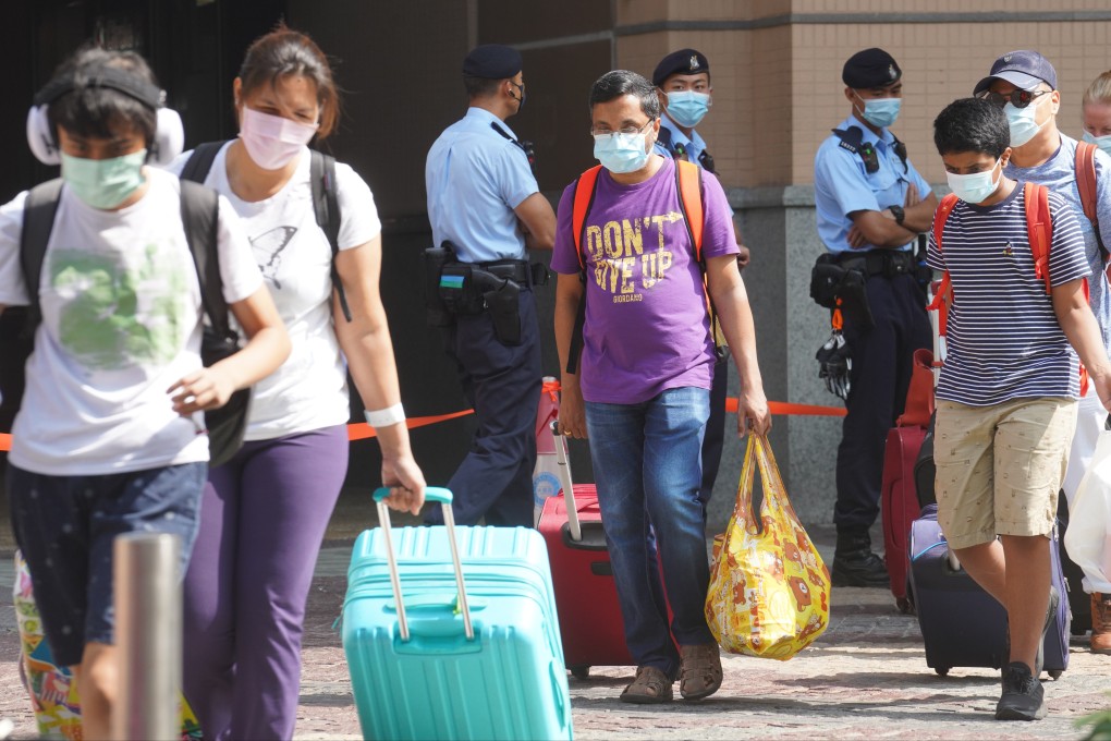 Residents are evacuated from a Tung Chung housing block after a resident was found to be carrying a mutated coronavirus variant. Photo: Winson Wong
