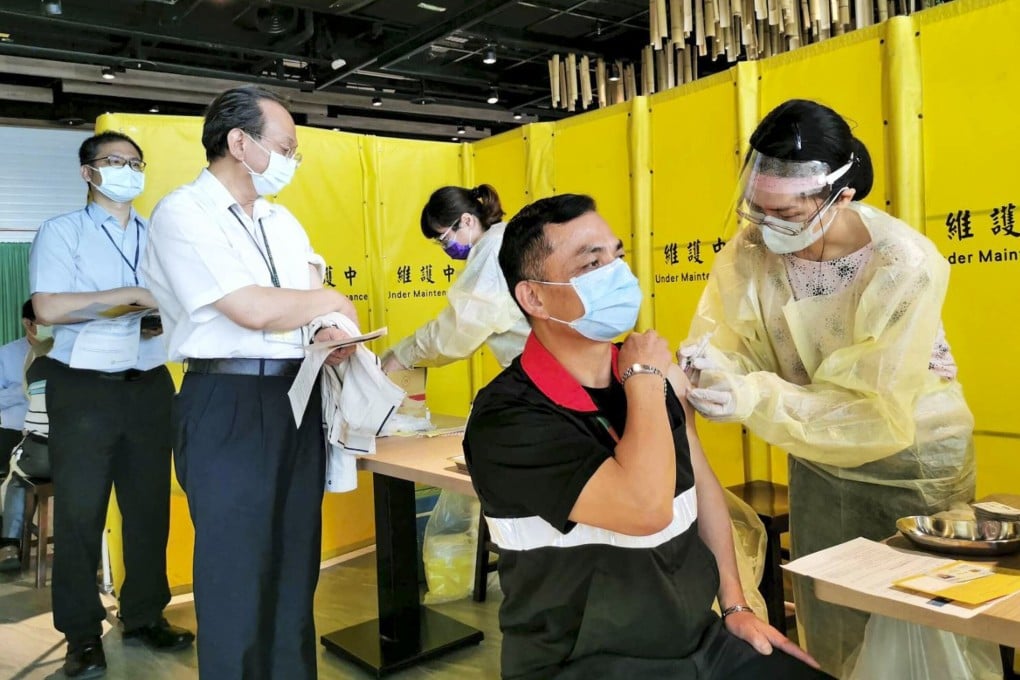 Taoyuan airport employees receive Covid-19 vaccination. Photo: CNA
