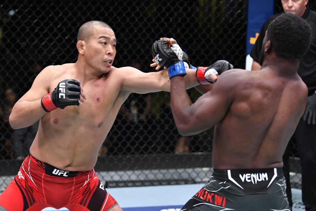 Park Jun-yong Park of South Korea punches Tafon Nchukwi in their middleweight bout during the UFC Fight Night event on May 8, 2021 in Las Vegas, Nevada. Photos: Chris Unger/Zuffa LLC