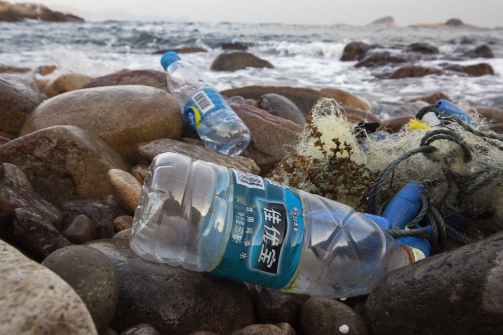 Discarded plastic water bottles are washed up on a beach in Lung Ha Wan, Clear Water Bay, Hong Kong, in December 2018. Photo: EPA-EFE