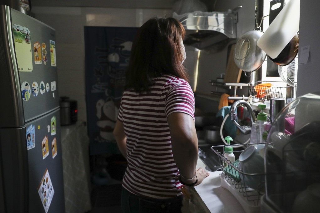 Zhen (not her real name), lost her husband to cancer, but soldiers on as a role model for her children. Photo: Edmond So