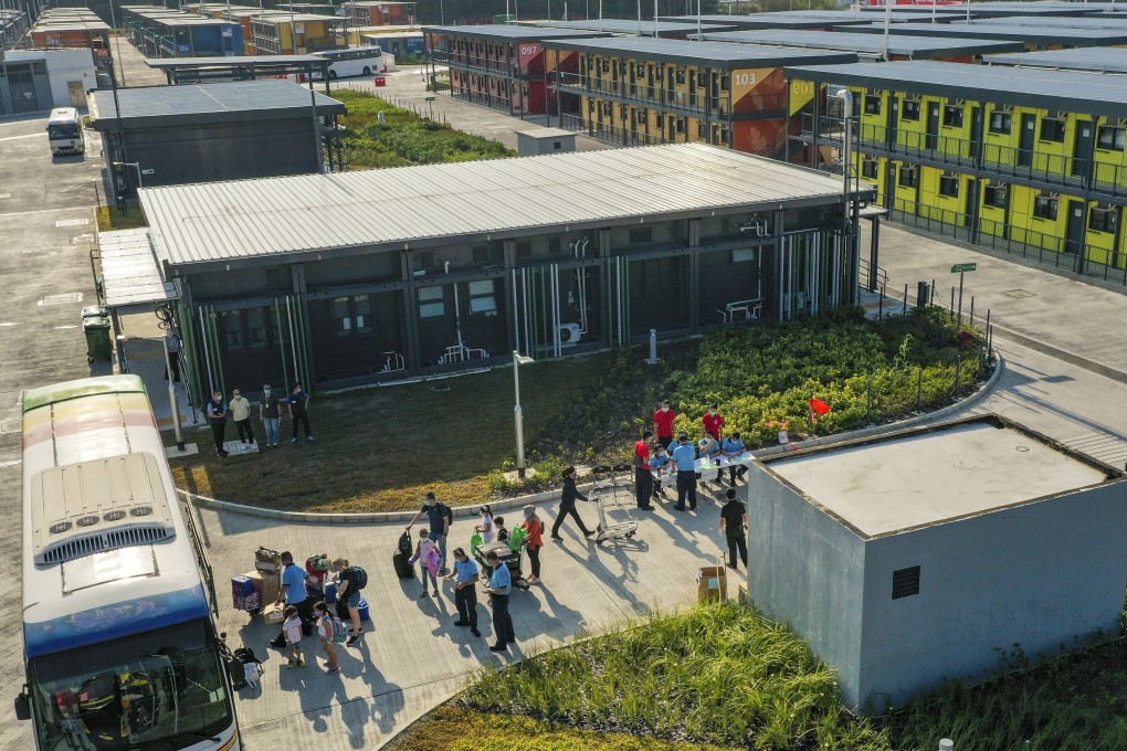 People leave a government quarantine centre at Penny’s Bay after a policy reversal on how to handle variant cases. Photo: Nora Tam