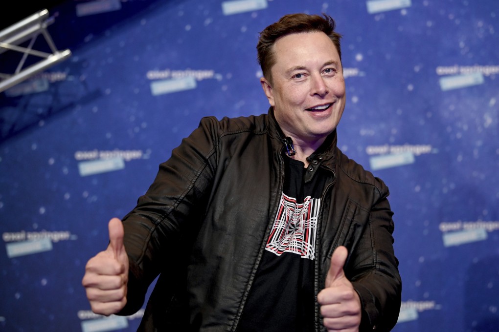 SpaceX owner and Tesla CEO Elon Musk arrives on the red carpet for the Axel Springer media award. Photo: AP