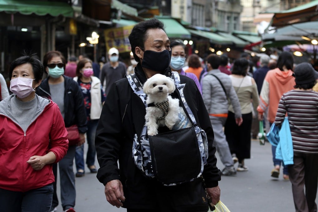 Taiwan has reintroduced mask rules as it tries to limit the spread of the coronavirus. Photo: AP