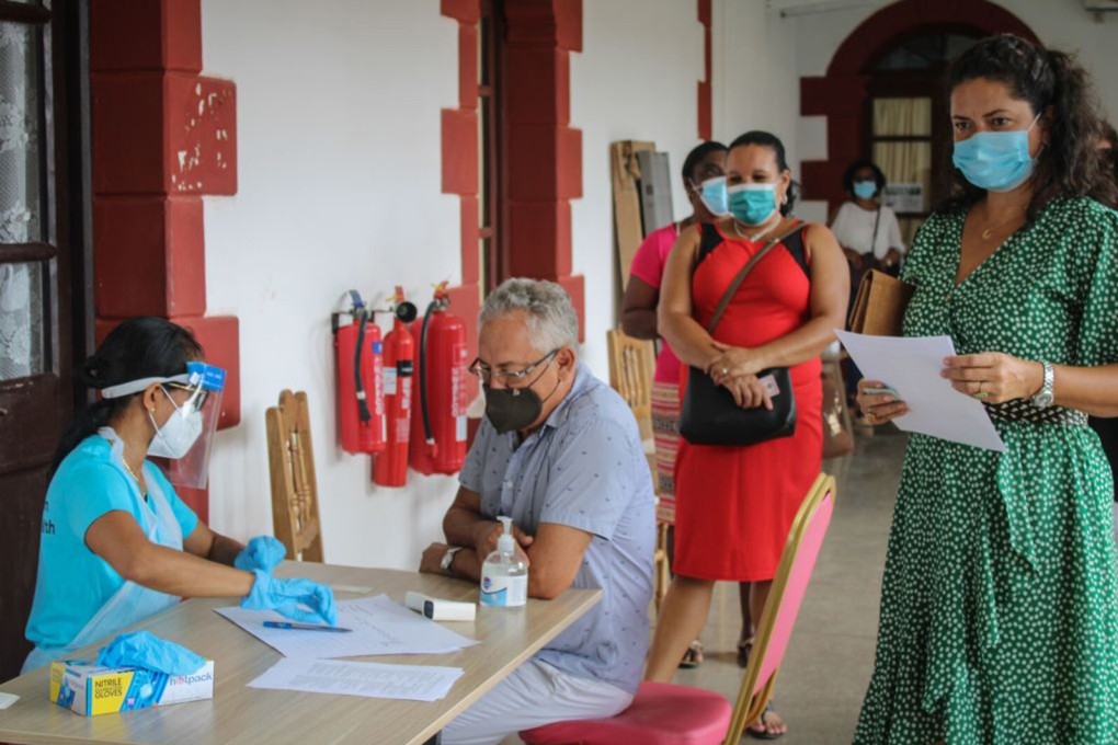 Seychelles' Minister for Fisheries Jean-François Ferrari waits to receive a dose of the Sinopharm Covid-19 vaccine at the Seychelles Hospital in Victoria on January 10. Photo: AFP via Getty Images/TNS