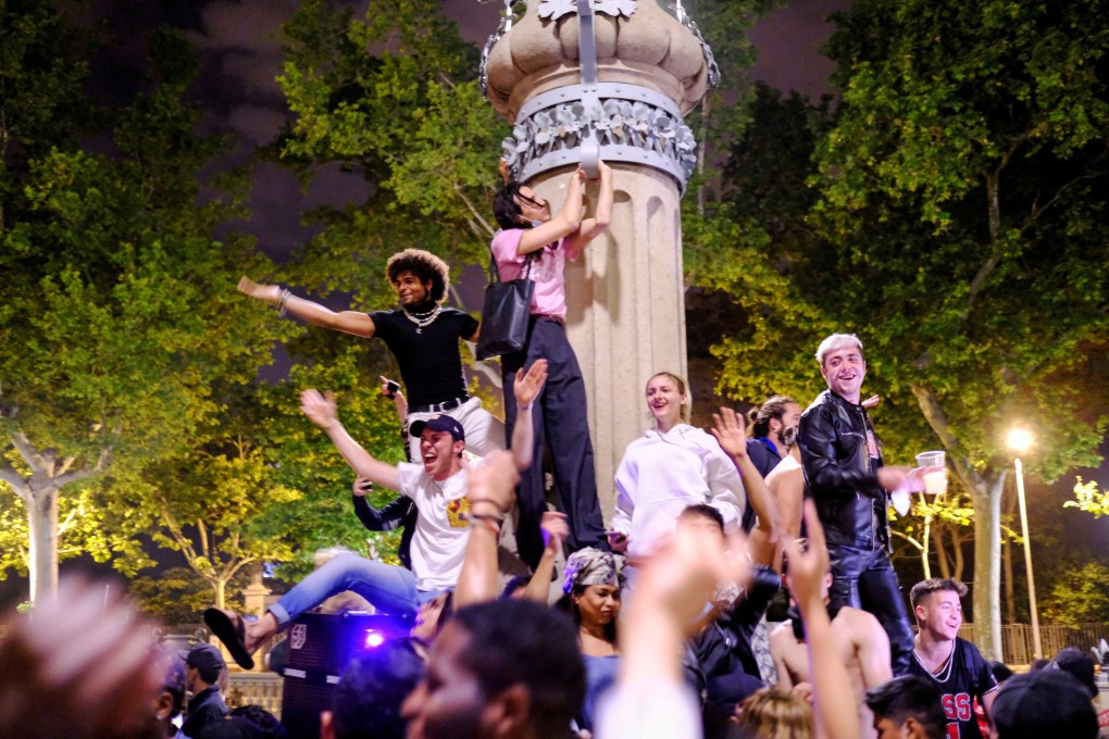 Revellers in Barcelona celebrate the end of a state of emergency over the weekend. Photo: Reuters
