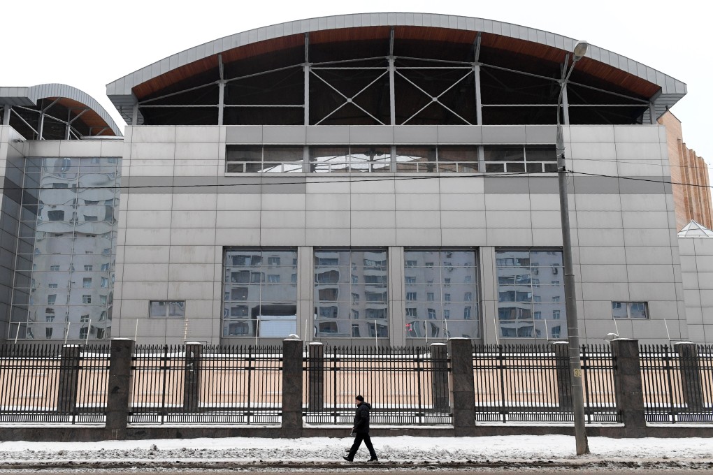 A man walks past the headquarters of the Russian General Staff's Main Intelligence Department (GRU) in Moscow in December 2016. Photo: AFP