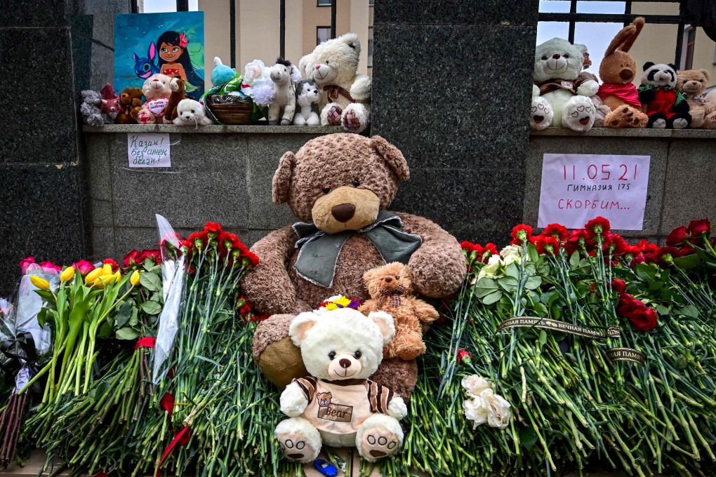 Flowers and toys left to commemorate victims of the shooting at School No 175 in Kazan, Russia on Wednesday. Photo: AFP