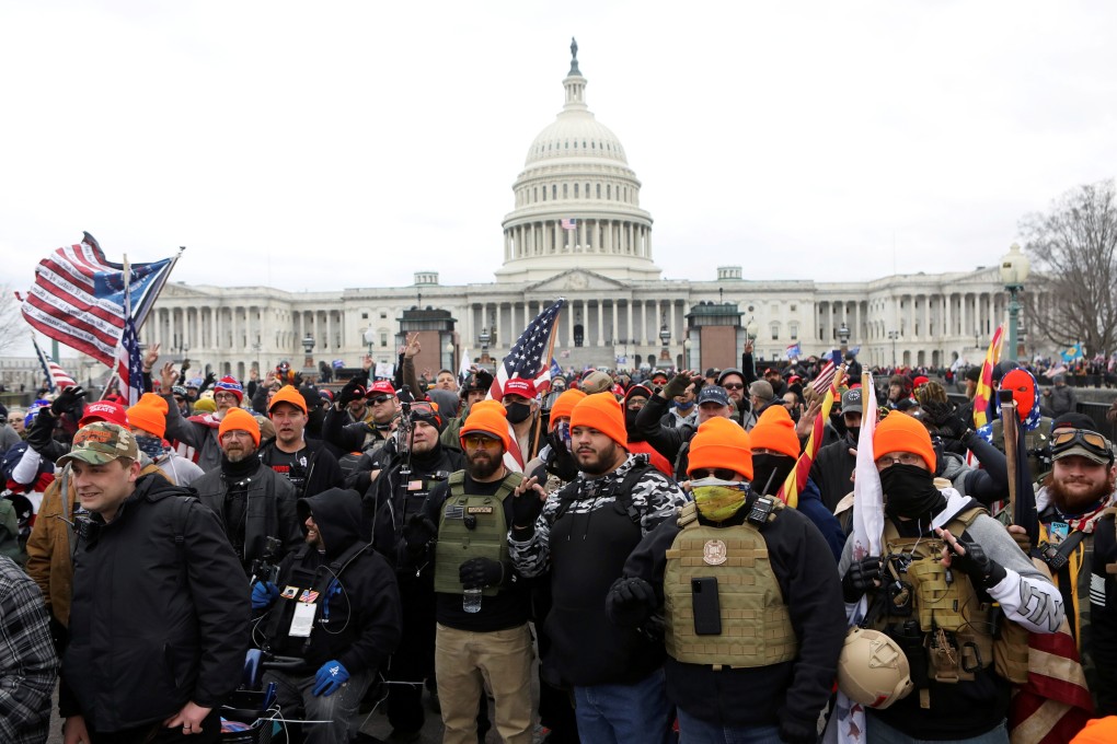 Members of the far-right group Proud Boys gather in front of the US Capitol Building, in Washington, on January 6. Photo: Reuters