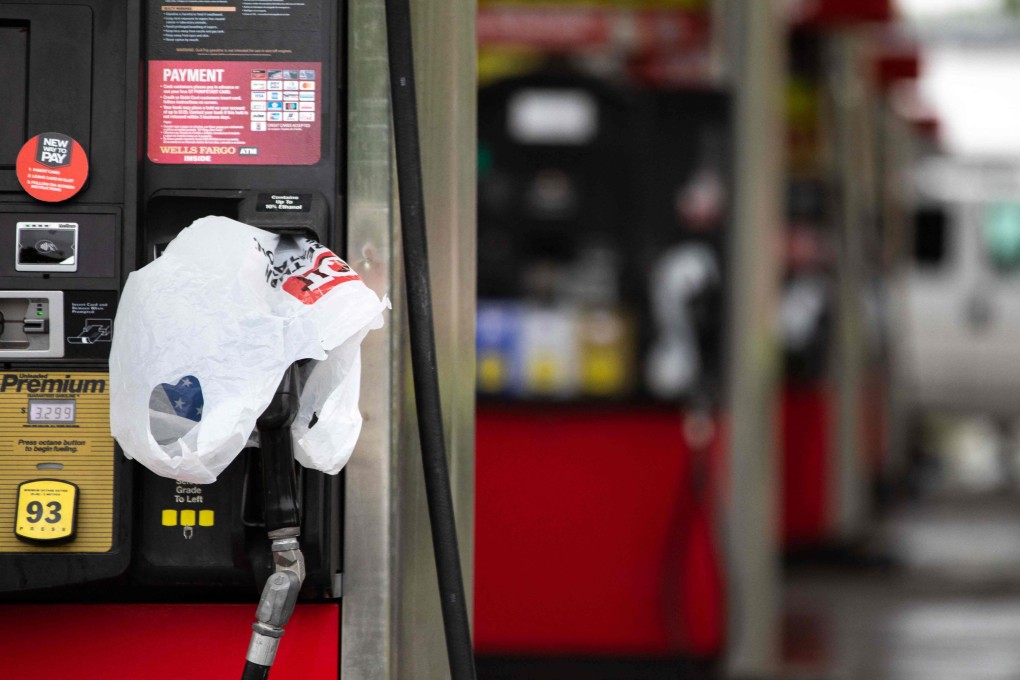 A plastic bag covers a pump handle at a petrol station in Charlotte, North Carolina, on Wednesday. Photo: AFP