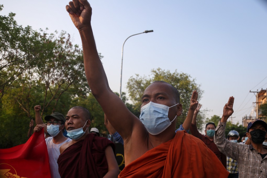 A monk gestures during an anti-coup protest in Mandalay, Myanmar, on May 10. Photo: EPA